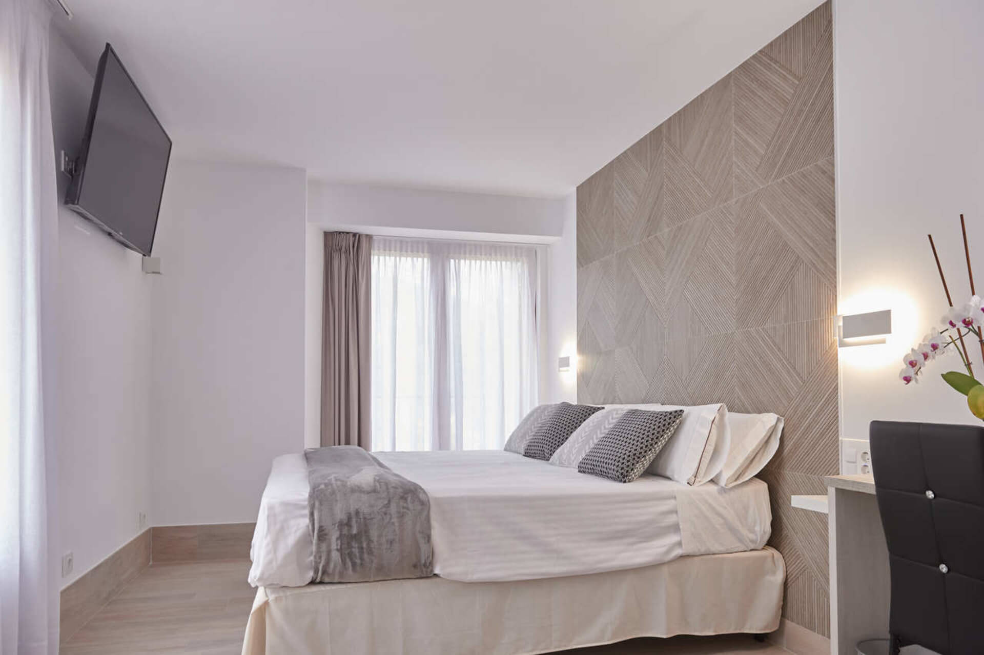 Cama de la habitación triple.