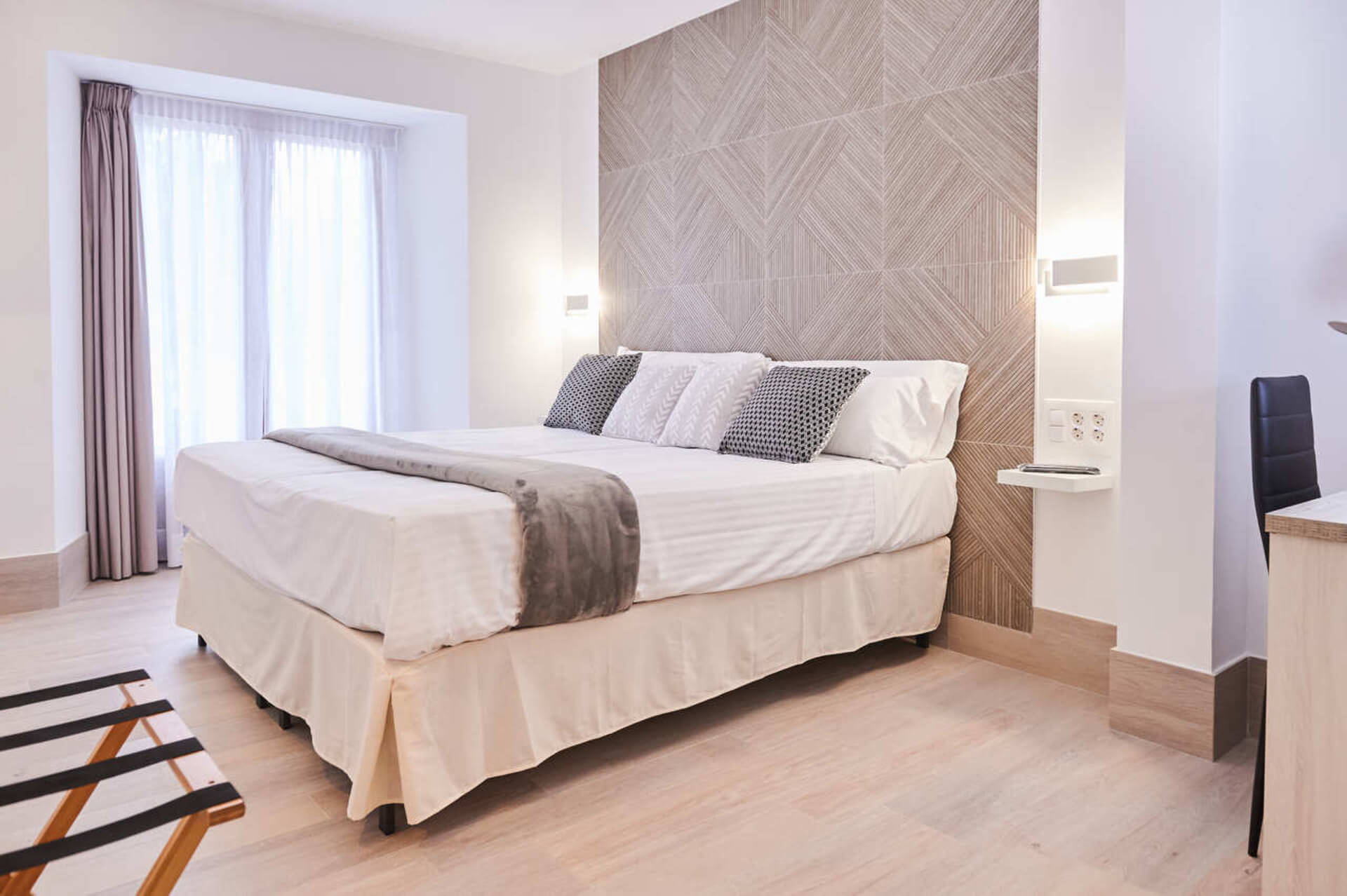 Cama de la habitación triple adaptada